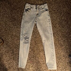 Distressed Light Wash Denim Jeans